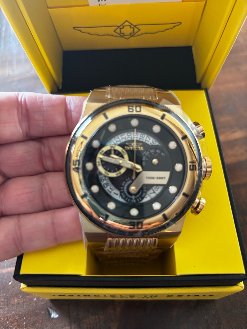 Invicta Gold and Black Bracelet Watch with Yellow Tag